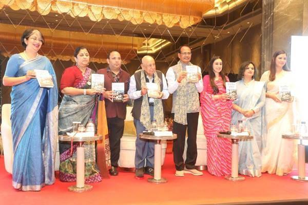 CM releases Hindi version of the book "Reporting India"