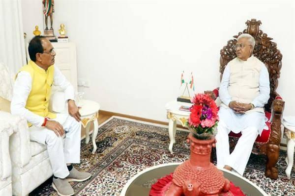 Courtesy meeting of Chief Minister Shri Chouhan with Governor Shri Patel