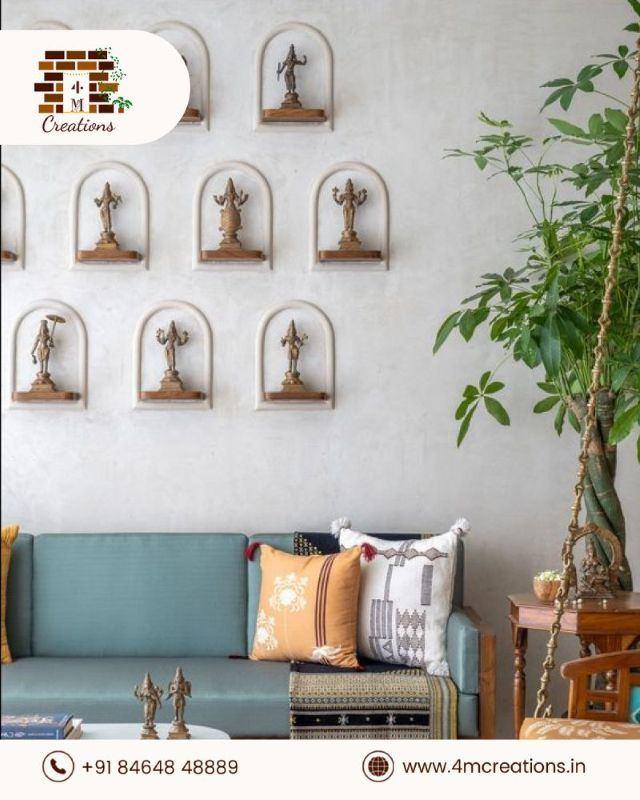 Traditional Wall Decor with Brass Idols and Elegant Seating